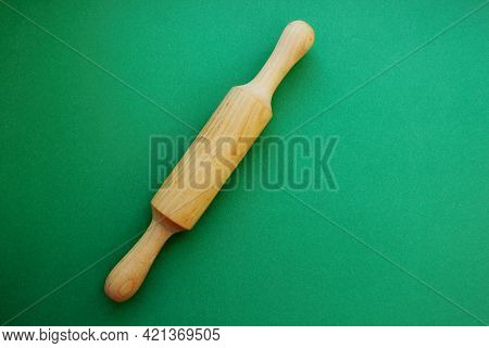 A Rock For A Test Made Of Wood On A Green Background. Cooking And Baking. Cookery. View From Above. 