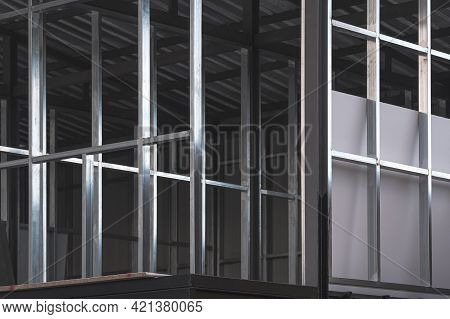 Perspective Side View Of Steel Wall Structure On Upper Floors Of Office Building Inside Of Incomplet