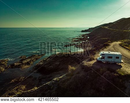 Spanish Rocky Coastline With Camper Car Camping On Cliff Sea Shore. Mediterranean Region Of Villaric