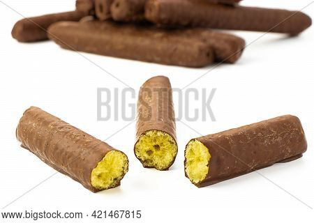 Corn Couple In A Cut In Chocolate On A White Background Isolated With Shadows