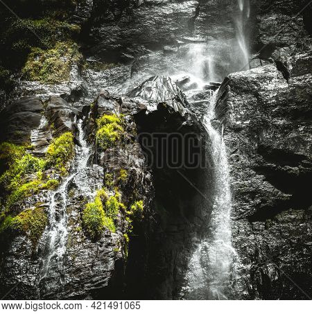 Stream Of Fresh Water Pouring Down Through The Rocks In A Tropical Forest, Natural Beauty Of The Mot
