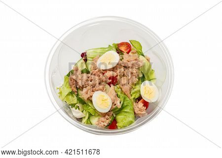 Fresh Tuna Salad With Lettuce, Cucombers, Cherries And Eggs In Plastic Container.  Top View.