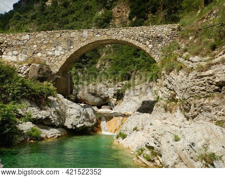 Stone Bridge In The Nervia Valley Near The Rio Barbaira Stream, Rocchetta Nervina, Liguria - Italy