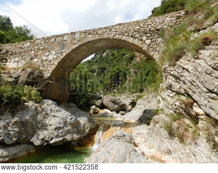Stone Bridge In The Nervia Valley Near The Rio Barbaira Stream, Rocchetta Nervina, Liguria - Italy
