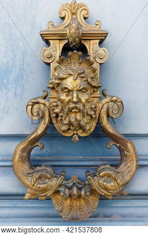 European Vintage Old Metal Wrought Iron Door Knocker. Design Detail. Paris.