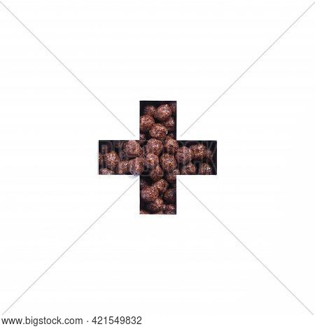 Plus Summation Sign Or Cross Of Chocolate Cereal Balls Isolated On White. Healthy Eating, Calories C