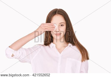 Pretty Girl Indoor Portrait. Light Background. Female Teenager Person. Long Brow Hair. Cleansing Dir