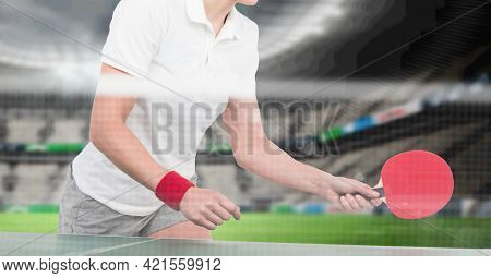 Composition of mid section of female table tennis player holding ball and racket. sport, fitness and active lifestyle concept digitally generated image.