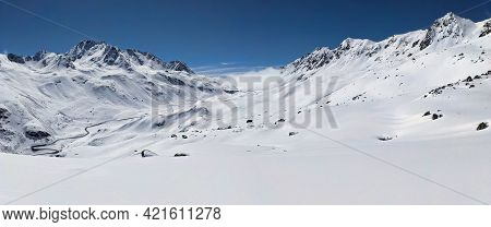 Large Mountain Panorama Picture. View Of The Fluelapss Above Davos. Beautiful Winter Landscape. Skit