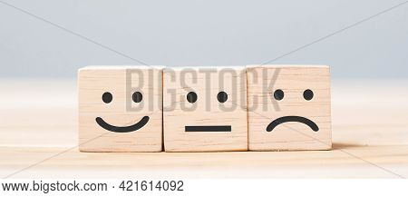 Emotion Face Symbol On Wooden Cube Blocks. Service Rating, Ranking, Customer Review, Satisfaction An