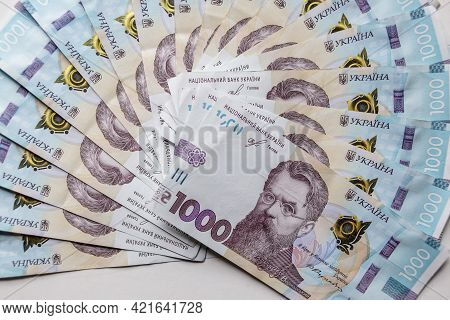 Ukrainian Money Hryvnya On A White Background. The National Currency Banknotes. Close Up Finance Bac