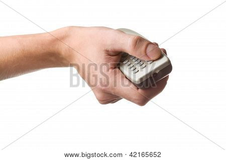 Man's hand with tv remote