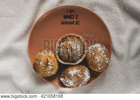 Four Cupcakes On A Pink Plate - Top View