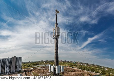 Telecommunication Tower With Microwave Equipment 5g, Radio Panel Antennas, Outdoor Remote Radio Unit