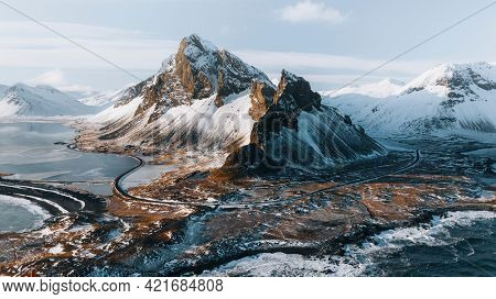 Drone view of a snow covered Eystrahorn mountain in Iceland