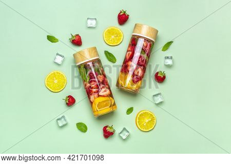 Strawberry Infused Water, Cocktail, Lemonade Or Tea. Summer Iced Cold Drink With Strawberry, Lemon A