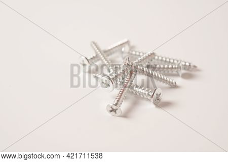 Tapping Screws Made Of Steel, Metal Screws, Iron Screws Isolated On White