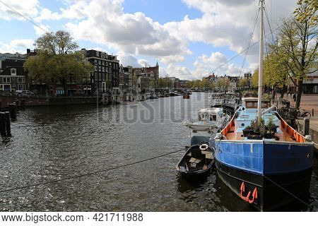 A Characteristic Canal In The City Of Amsterdam. High Quality Photo