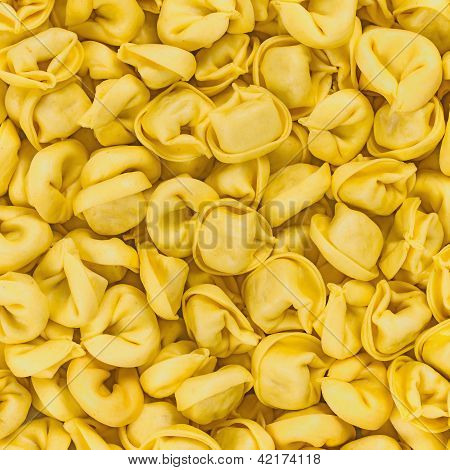 Tortellini Emiliani italien Macaroni pâtes farcies Texture d'arrière-plan