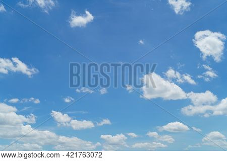 Hello Summer Sky Is Bright Blue. There Are Clouds Floating Through. Feel Relax When Looking. See The