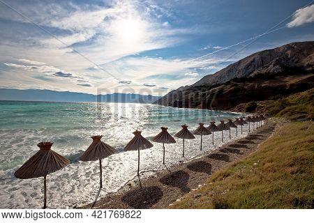 Idyllic Beach In Baska Sun Shades View, Island Of Krk, Croatia. Baska Is Famous Tourist Destination 