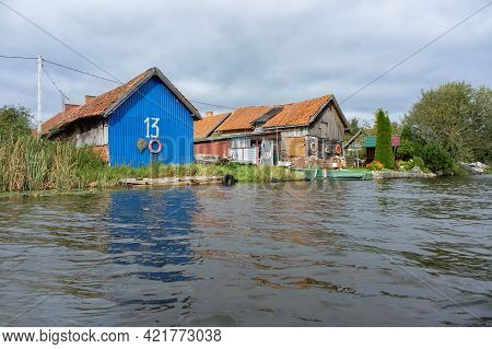Matrosovka River, Polessky District, Kaliningrad Region, Russia, September 21, 2019. Wooden Houses O