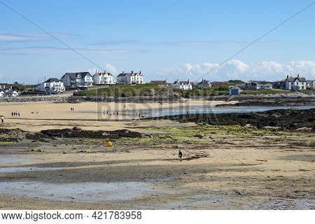 Trearddur Bay, Anglesey, Wales Beautiful Coastal Landscape Broad Sandy Beach At Low Tide Rocky Sea S
