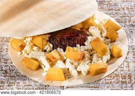 Traditional Colombian Dessert - Wafers With Fruit, Cheese And Caramel Sauce