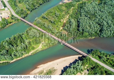 Panoramic Aerial View Of The River And Road Bridge. Beautiful River Banks, Rural Andscape, Skyview. 
