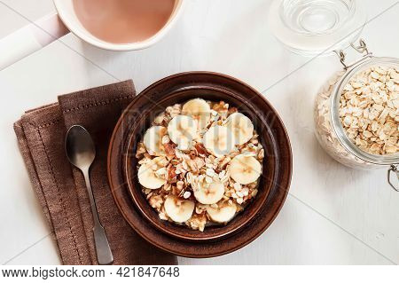 Dish Of Banana Oatflakes Granola With Cocoa