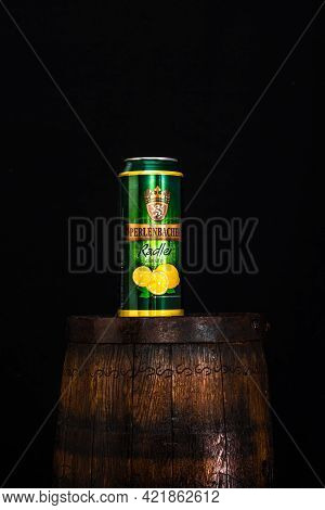 Can Of Perlenbacher Radler Beer On Beer Barrel With Dark Background. Illustrative Editorial Photo Sh