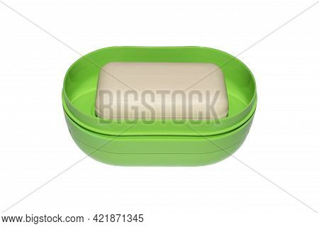 Soap Dish With Soap Isolated On A White Background.soap In A Plastic Soap Dish Top View.