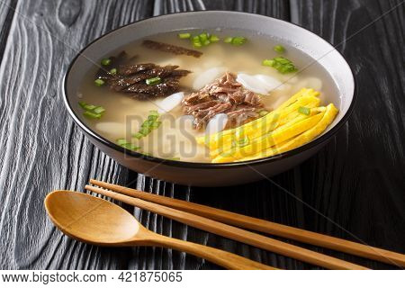 Korean Rice Cake Soup Tteokguk For New Year Closeup In The Bowl On The Table. Horizontal