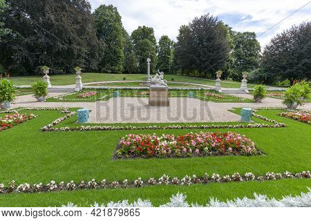 Lancut, Poland - August 26, 2020: Italian Garden - Sculpture Of Bacchus On The Panther In Front Of 1