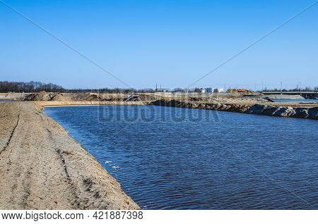 Construction Of A New Road. Erection Of A Sand Cushion Under The Asvalt Canvas. Completed Engineerin
