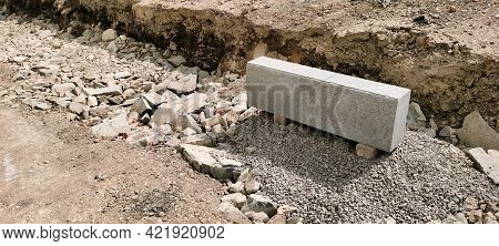 Road Repairs. Laying Of A Curbstone. New Curb. Replacing Old Curbs With New Ones Before Paving The R