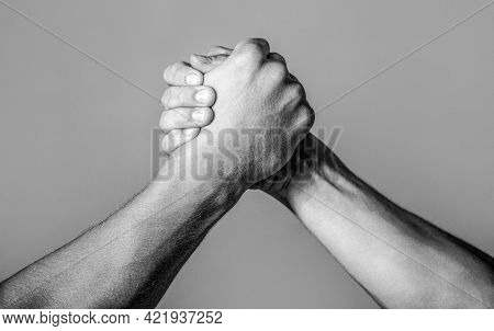 Friendly Handshake, Friends Greeting, Teamwork, Friendship. Handshake, Arms, Friendship. Hand Rivalr