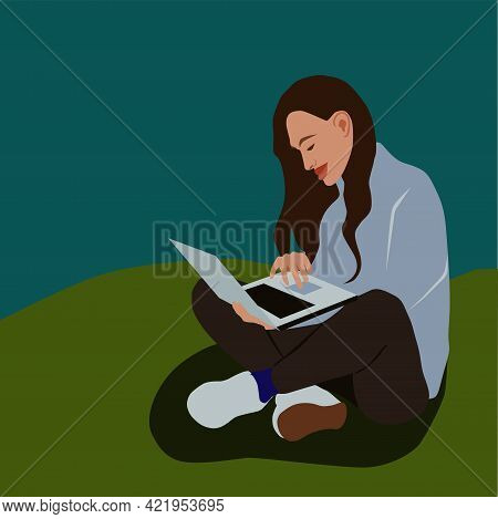 A Cute Girl Is Studying Business Subjects Using A Computer.