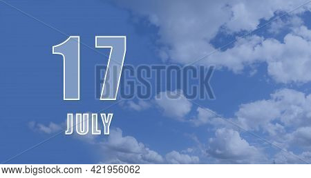 July 17. 17-th Day Of The Month, Calendar Date.white Numbers Against A Blue Sky With Clouds. Copy Sp