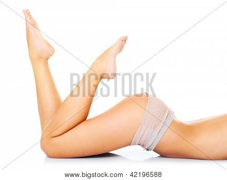 Ein Bild von einer sexy Frau liegend over white background