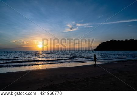 Silhouette People With Beautiful Idyllic Seascape Sunset View On Kohkood Island In Low Season Travel