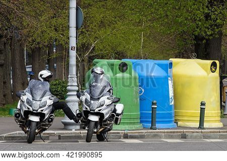 Bucharest, Romania - April 15, 2021: Two Policemen Sitting On Bmw R 1200 Rt Authority Motorcycles, T