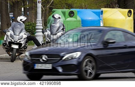Bucharest, Romania - April 15, 2021: Two Policemen Sitting On Bmw R 1200 Rt Authority Motorcycles, T