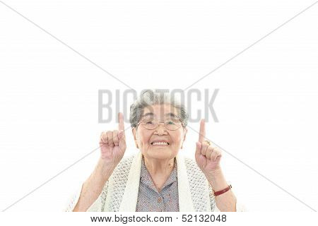 Old woman pointing