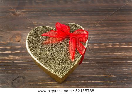 a box for a gift in the shape of a heart. photo icon for valentine's day, wedding anniversary, engagement.
