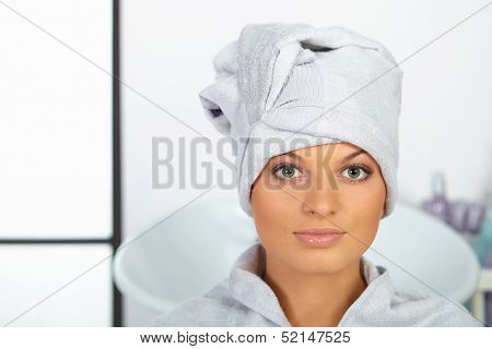 Hair Salon. Young Woman With Towel On Head.