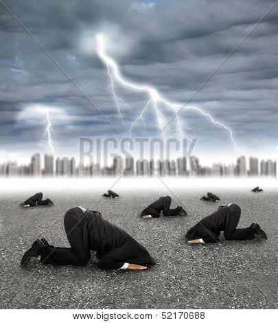 Scared Businessman Hiding On The Ground With Storm Coming