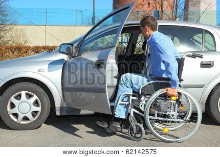 Wheelchair User Getting Into A Car