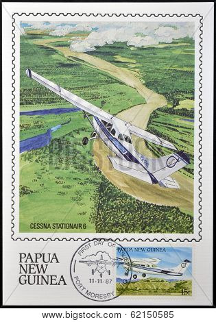 stamp shows A Cessna Stationair in flight over of Momase Region
