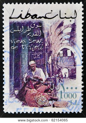 stamp printed in Lebanon shows View of street in Tripoli with traditional craftsman